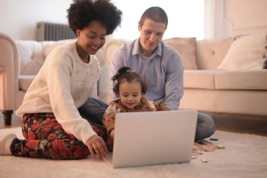 Family engaging with digital content through live chat monitoring software.