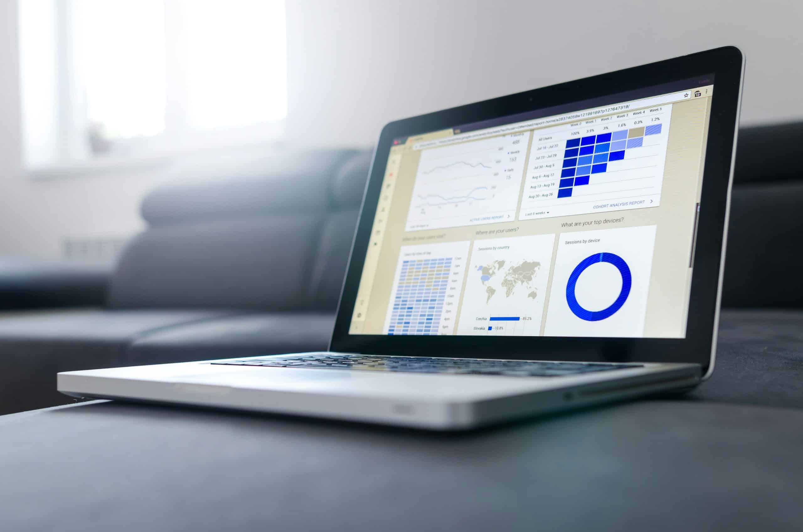 Alt text: Laptop screen displaying live chat monitoring analytics and customer interaction data.