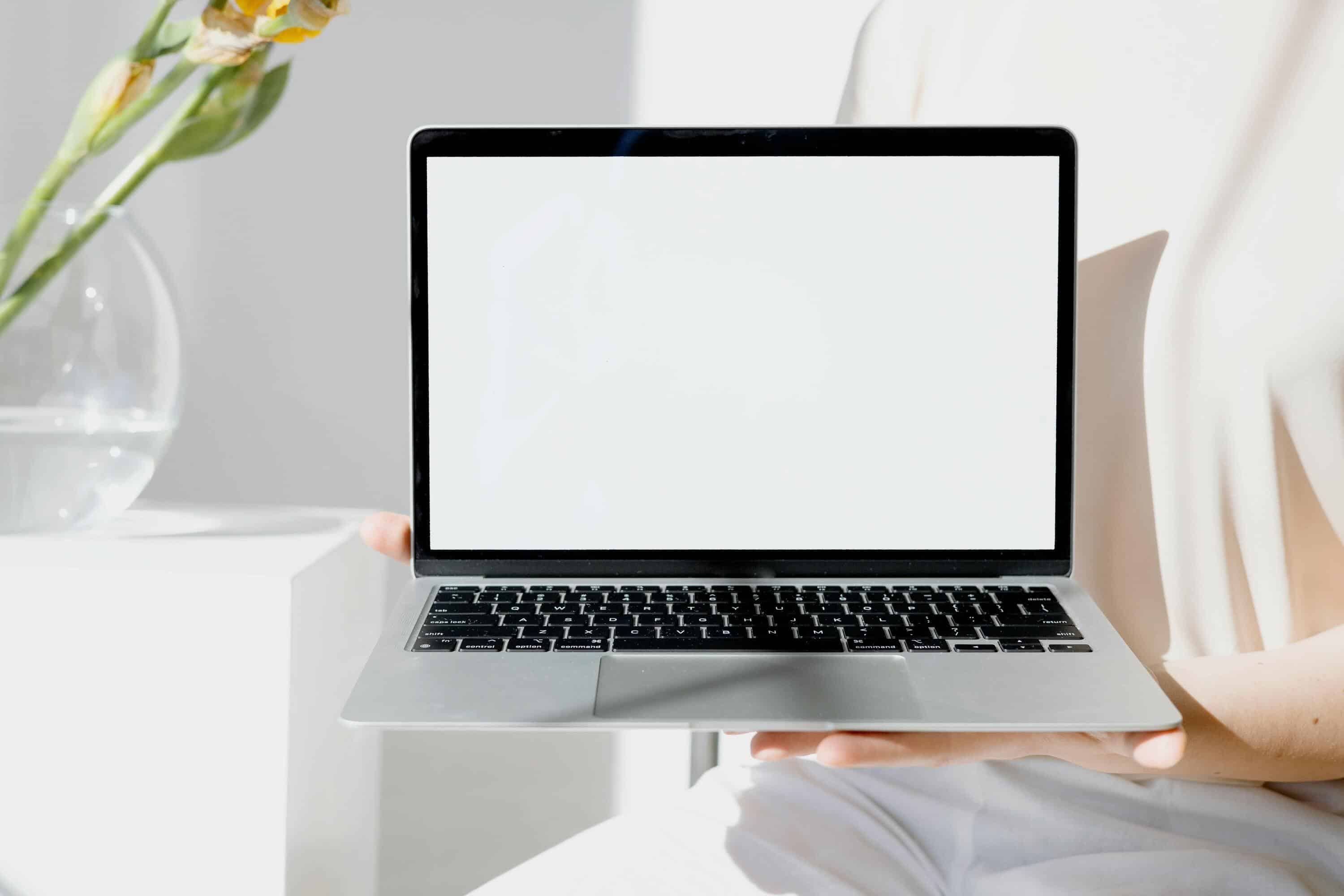 Live Chat Monitoring interface on a laptop screen for customer support management.